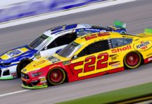 What To Expect In 2022 Joey Logano and Chase Elliott racing at Kansas Speedway 2019