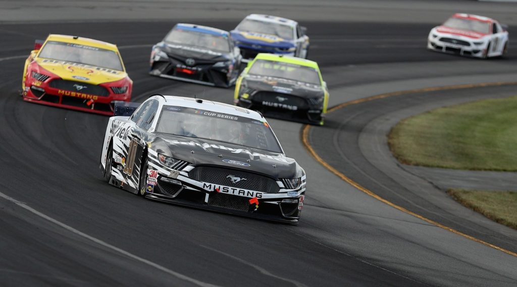 Aric Almirola leading at Pocono over Logano, Blaney, Truex, Elliott, DiBenedetto