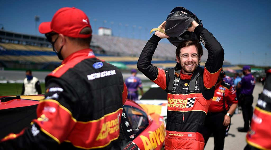 Ryan Blaney on pit road with helmet at Kentucky Speedway