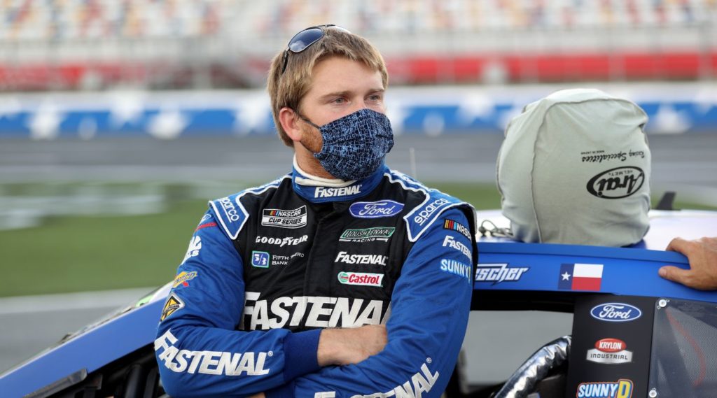 Chris Buescher arms crossed on pit road at Charlotte