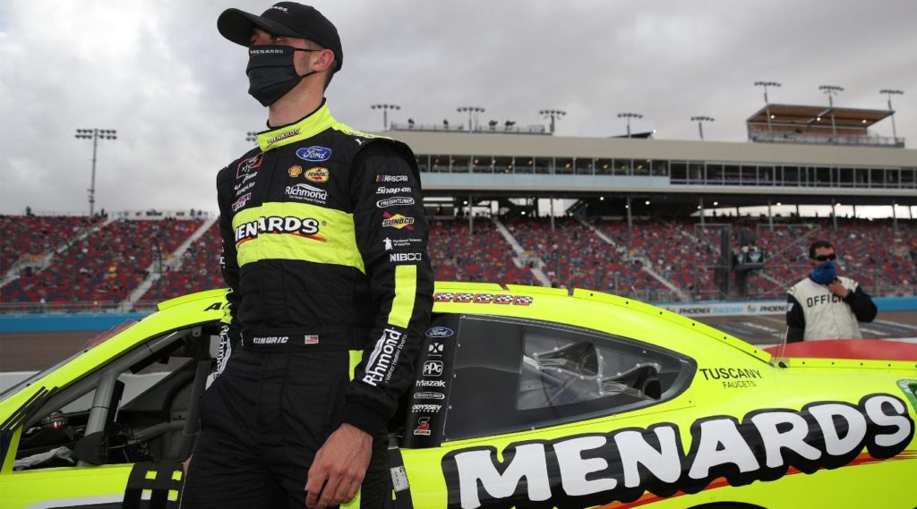 Austin Cindric sitting by car at Phoenix 2020