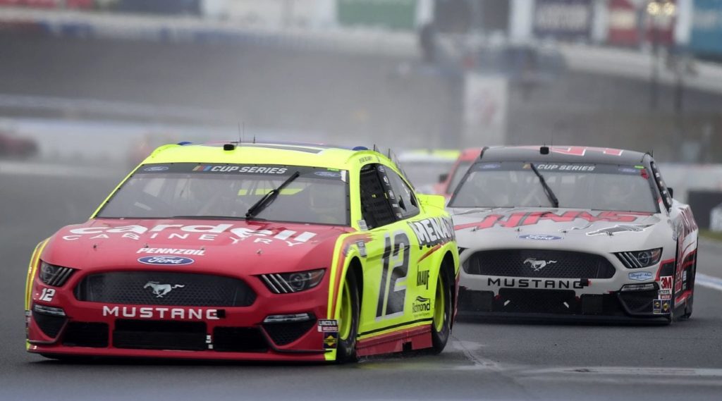 Ryan Blaney, the #12 Ford, races with Cole Custer, the #41 Ford at the Charlotte ROVAL in 2020