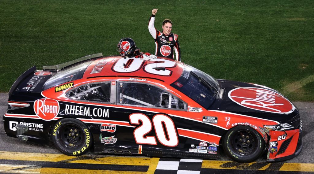 Christopher Bell hand in air celebrating after winning at Daytona Road Course 2021