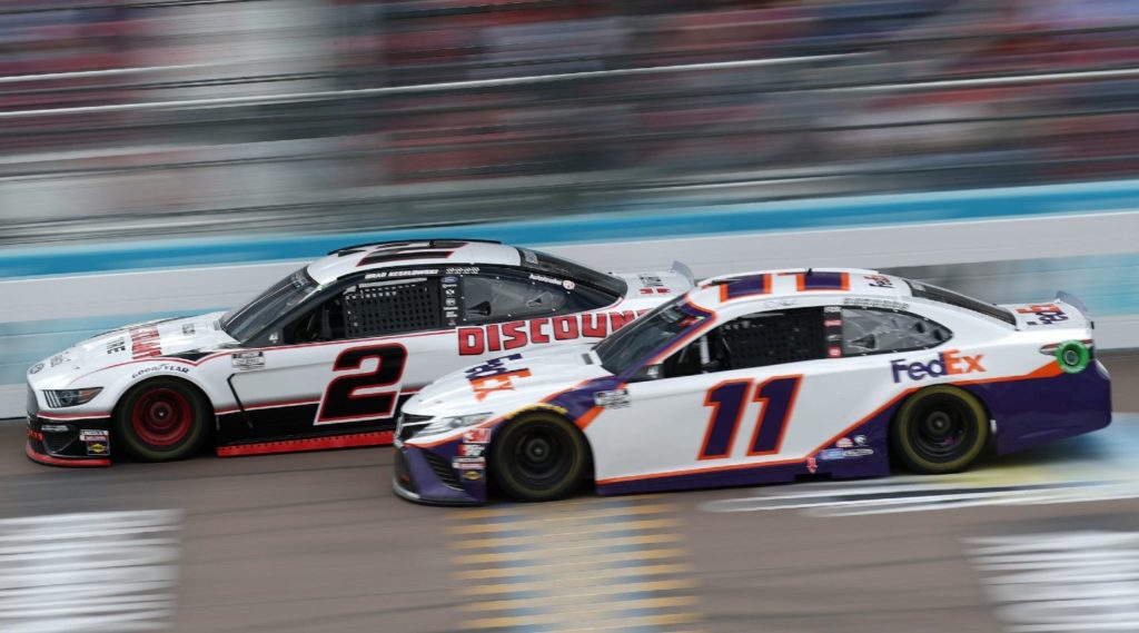 Denny Hamlin and Brad Keselowski racing at Phoenix in the 2020 finale race