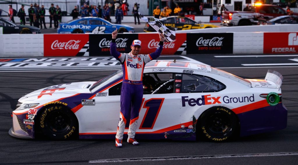 Denny Hamlin celebrating win at Pocono 2020