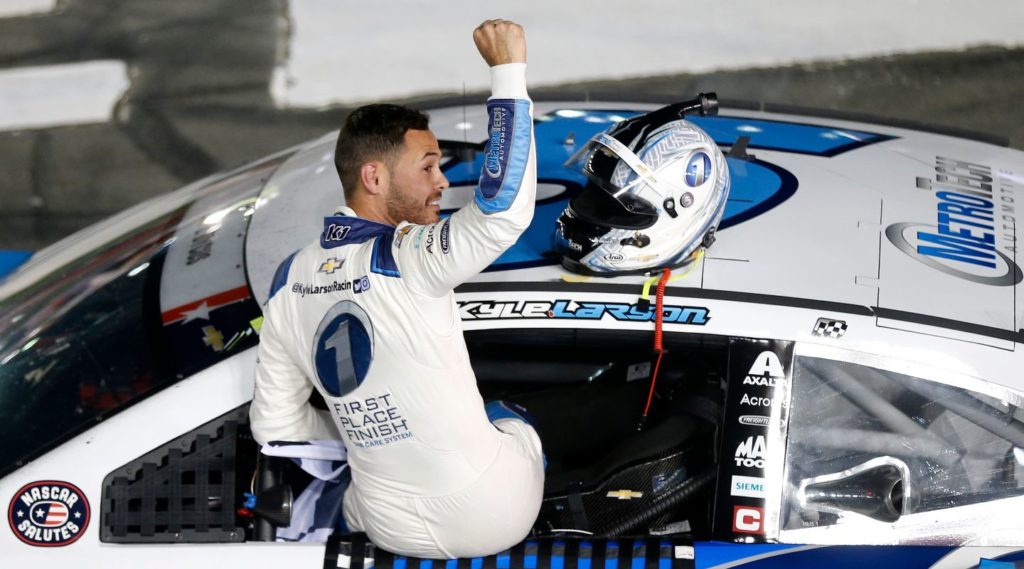 Kyle Larson fist in air after winning 2021 Coca-Cola 600 at Charlotte Motor Speedway