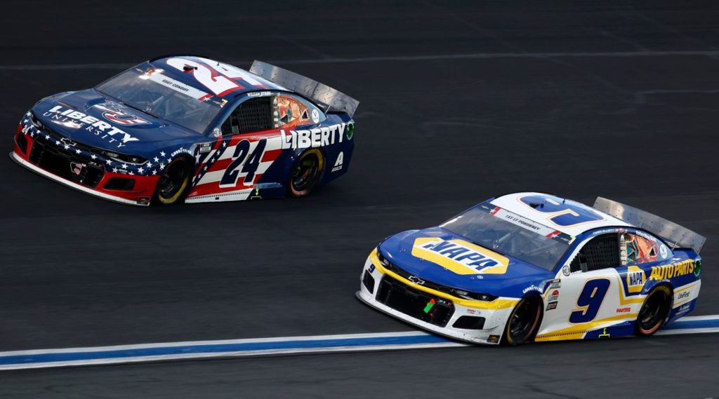 William Byron and Chase Elliott racing side by side in the 2021 Coca-Cola 600 at Charlotte Motor Speedway
