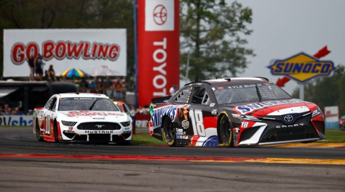 Kyle Busch and Aric Almirola racing at Watkins Glen 2021