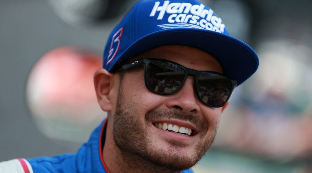 Kyle Larson, driver of the #5 HendrickCars.com Chevrolet, waits on the grid prior to the NASCAR Cup Series Verizon 200 at the Brickyard at Indianapolis Motor Speedway on August 15, 2021 in Indianapolis, Indiana.